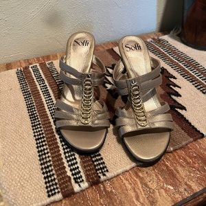 High heeled gold woman’s shoes from Sofft